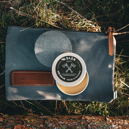 Axe and hatchet care set including whetstone, balm and bag